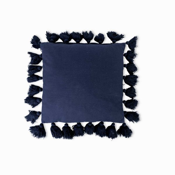 Cojín borlas azul